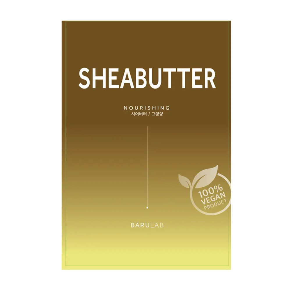 Balenie masky BARULAB "SHEABUTTER Nourishing", označené ako "100% Vegan Product". Balenie má farebný prechod z tmavo zlatej hnedej hore na svetlo žltú dole.