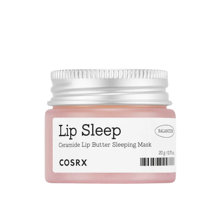 COSRX Lip Sleep Ceramide Lip Butter Sleeping Mask v ružovej nádobe so strieborným viečkom. Bezvonná, výživná nočná maska pre jemné, hydratované pery.