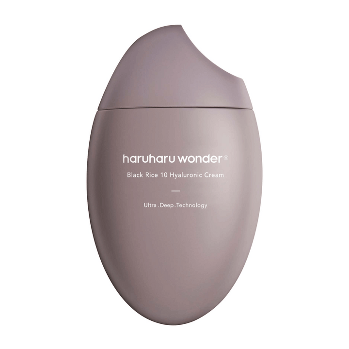 Hladké a elegantné balenie "Haruharu Wonder Black Rice 10 Hyaluronic Cream", označené bielym textom. Balenie používa "Ultra Deep Technology", čo naznačuje pokročilú formulu pre hlbokú hydratáciu pokožky.