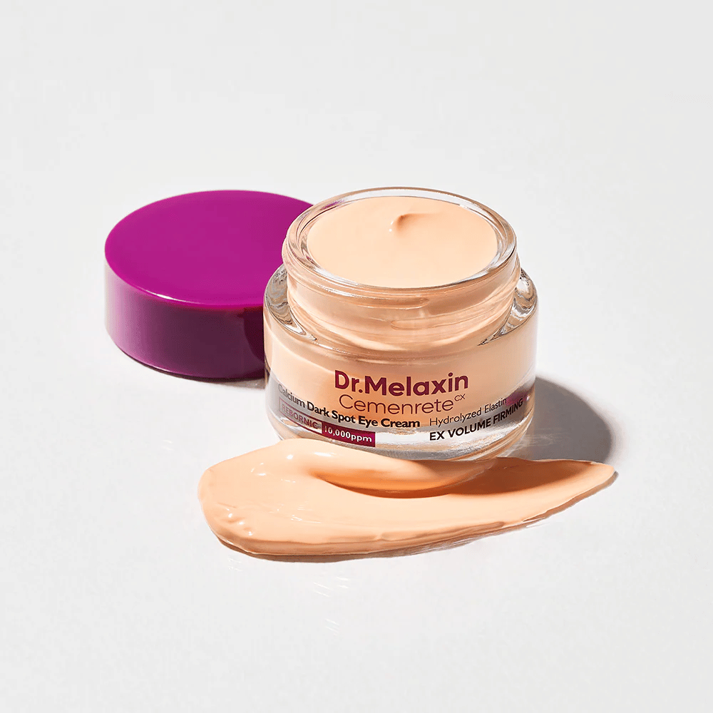 Dr.Melaxin Cemenrete Calcium Dark Spot Eye Cream v otvorenej nádobe s krémovou textúrou, očný krém, ktorý pomáha redukovať tmavé kruhy a spevňuje pokožku okolo očí.