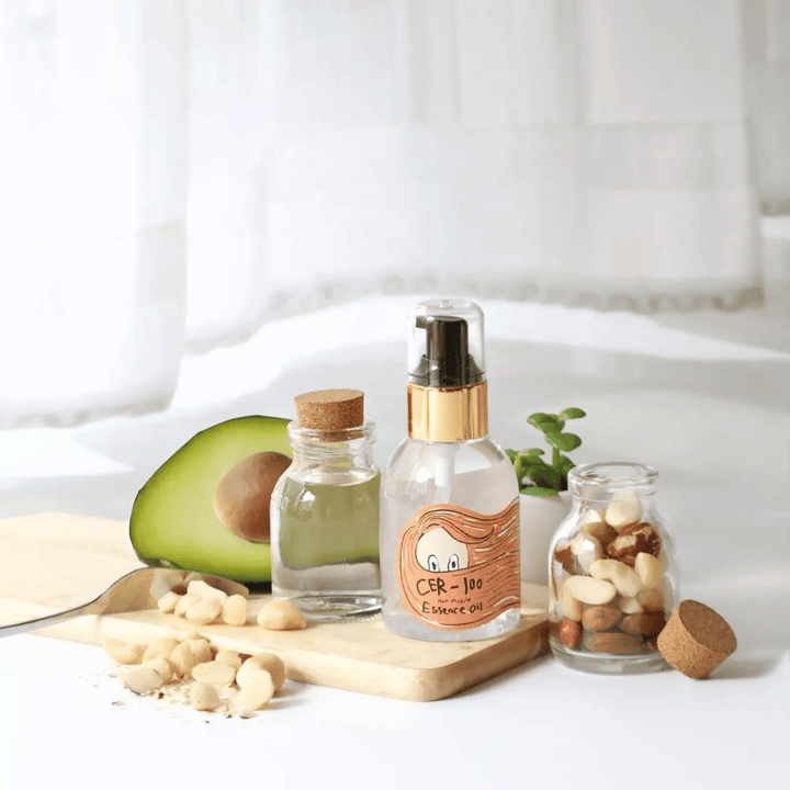Elizavecca CER-100 Hair Muscle Essence Oil – kórejský vlasový olej s avokádom a prírodnými olejmi, ktorý pomáha hydratovať, posilňovať a dodávať lesk suchým a poškodeným vlasom.