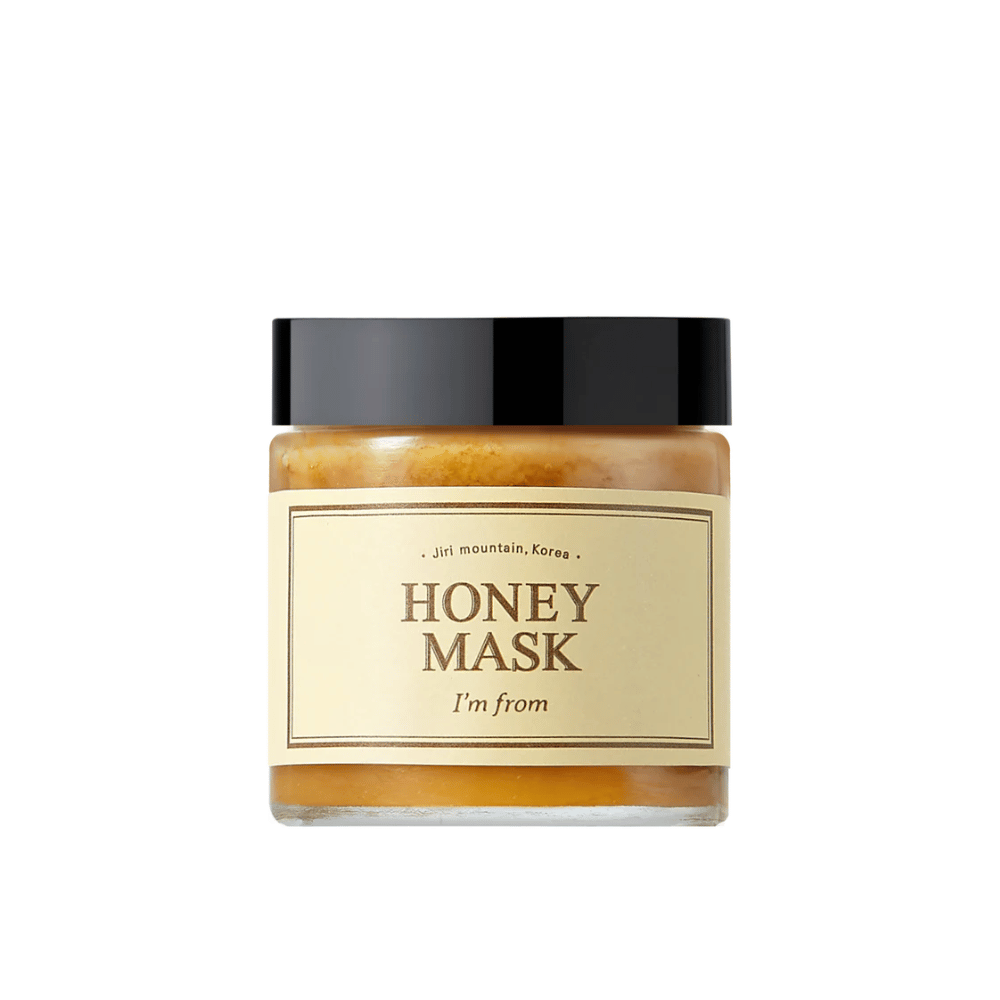  Plechovka "I'm from Honey Mask", s prírodným obsahom medu, na bielom pozadí.