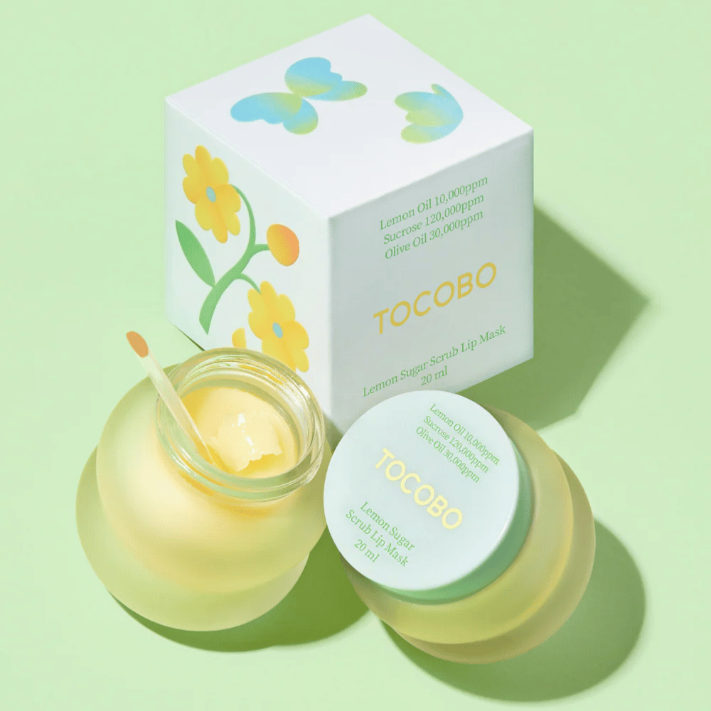 Tocobo Lemon Sugar Scrub Lip Mask spolu so svojím obalom s kvetinovým dizajnom na svetlozelenom pozadí.