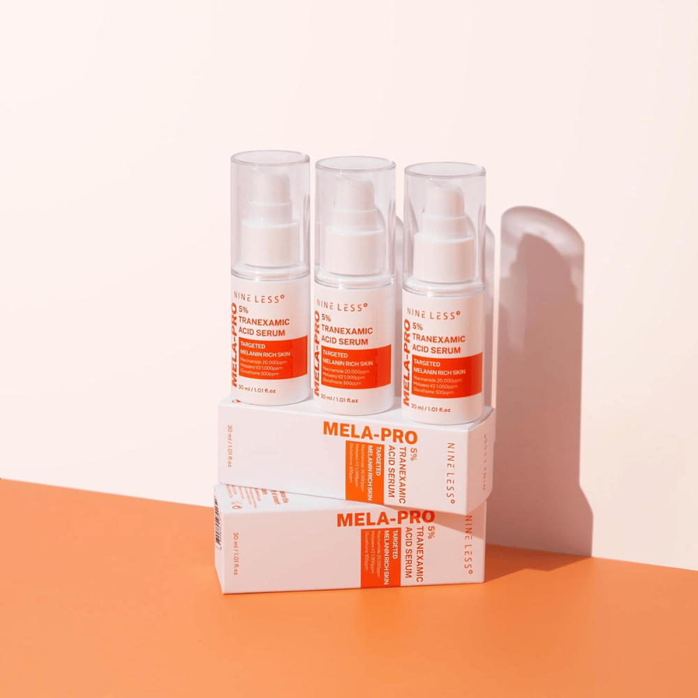 Tri NINE LESS MELA-PRO 5% Tranexamic Acid Serum 30 ml, zosvetľujúce sérum s niacínamidom a glutathionom pre pokožku bohatú na melanín.