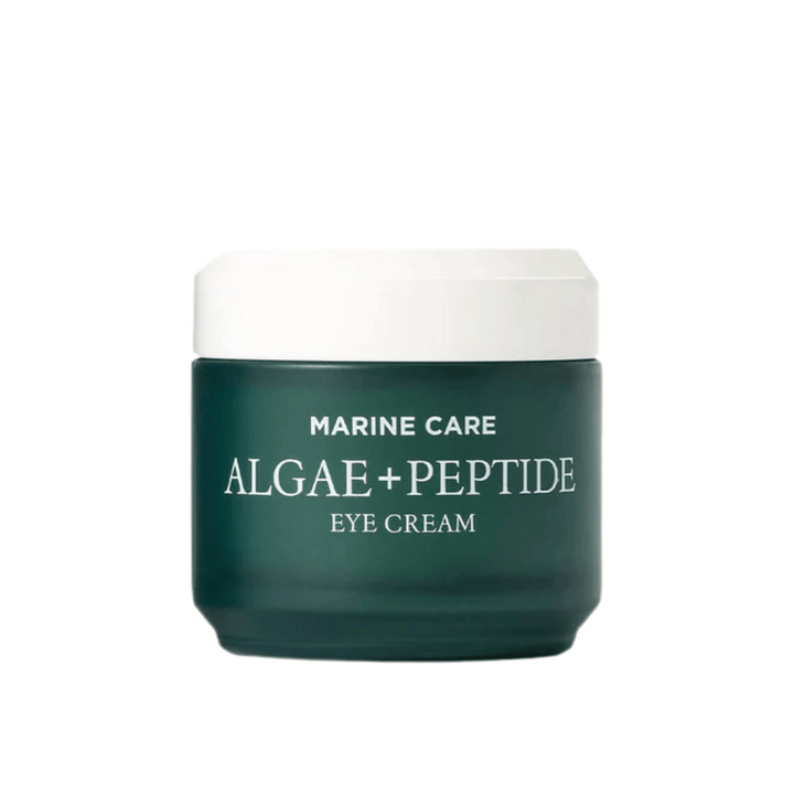Heimish Marine Care Algae + Peptide Eye Cream v tmavozelenej nádobe s bielym vrchnákom. Očný krém obohatený o riasy a peptidy na hydratáciu, rozjasnenie a redukciu jemných liniek okolo očí.