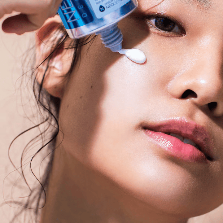 Neogen Dermalogy Day-Light Protection Airy Sunscreen SPF50 50ml – hydratačný kórejský opaľovací krém so širokospektrálnou UV ochranou, aplikovaný na pokožku.