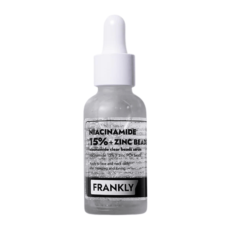 Obrázok produktu FRANKLY Niacinamide 15% + Zinc Beads Serum v sklenenej fľaši s pipetou. Sérum, ktoré vyrovnáva, upokojuje a zlepšuje jas pleti.