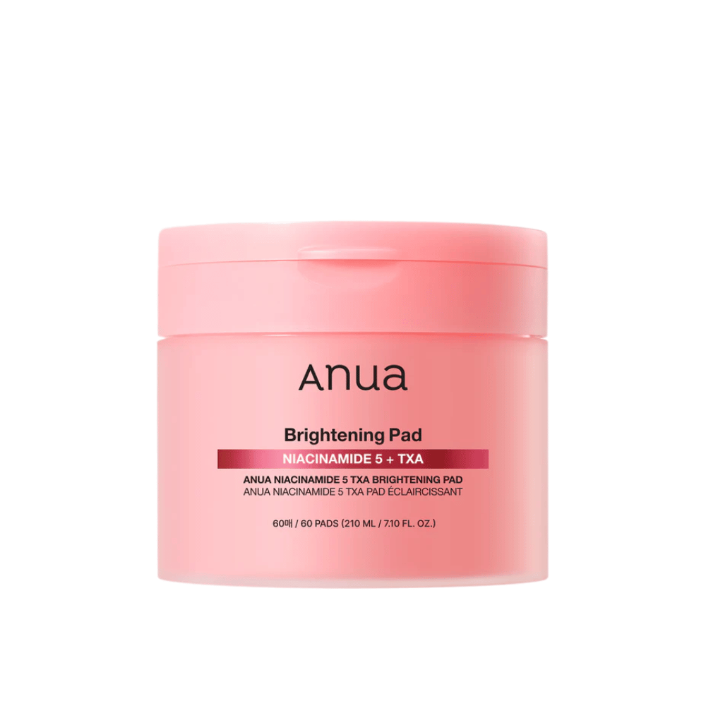 Ružové balenie Anua Brightening Pad s textom "Niacinamide 5 + TXA", obsahuje 60 vankúšikov na starostlivosť o pleť so zameraním na žiarivosť a rovnomernejší tón pleti.