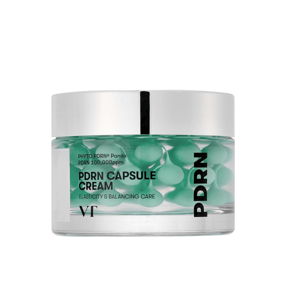 VT PDRN Capsule Cream v priehľadnej nádobe so strieborným viečkom. Obsahuje zelené kapsuly v čírom géli a etiketa ukazuje, že krém je určený na elasticitu a vyváženú starostlivosť o pleť.
