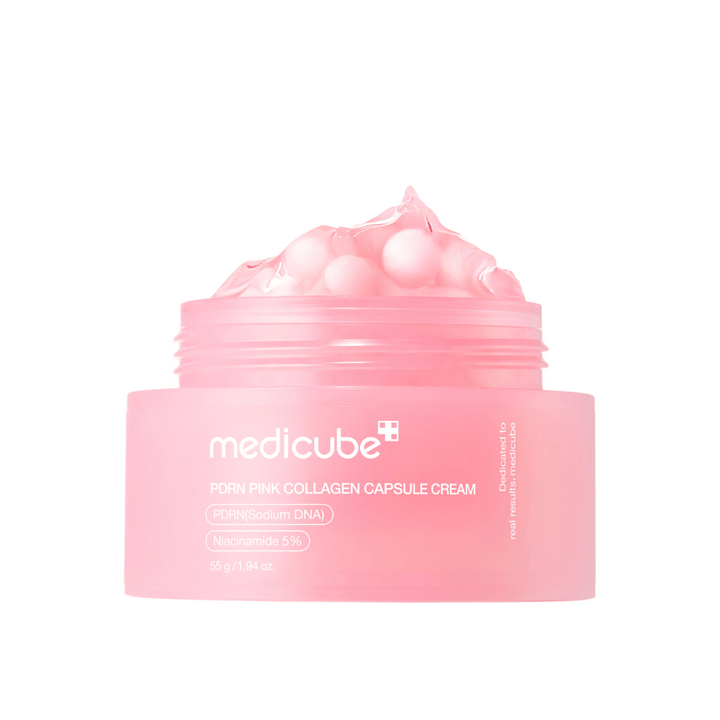 Obrázok produktu Medicube PDRN Pink Collagen Capsule Cream s viditeľnými ružovými kapsulami v priehľadnej ružovej nádobe, navrhnutý na hydratáciu a vyrovnanie tónu pleti.