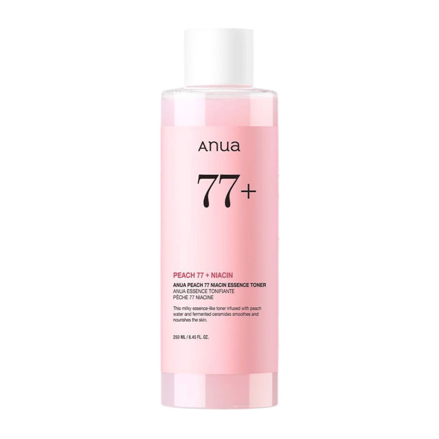 Anua Peach 77 Niacin Essence Toner v priehľadnej ružovej fľaši s bielym uzáverom, obsahujúca 250 ml mliečneho tonera pre rovnomernejší tón pleti a jas.