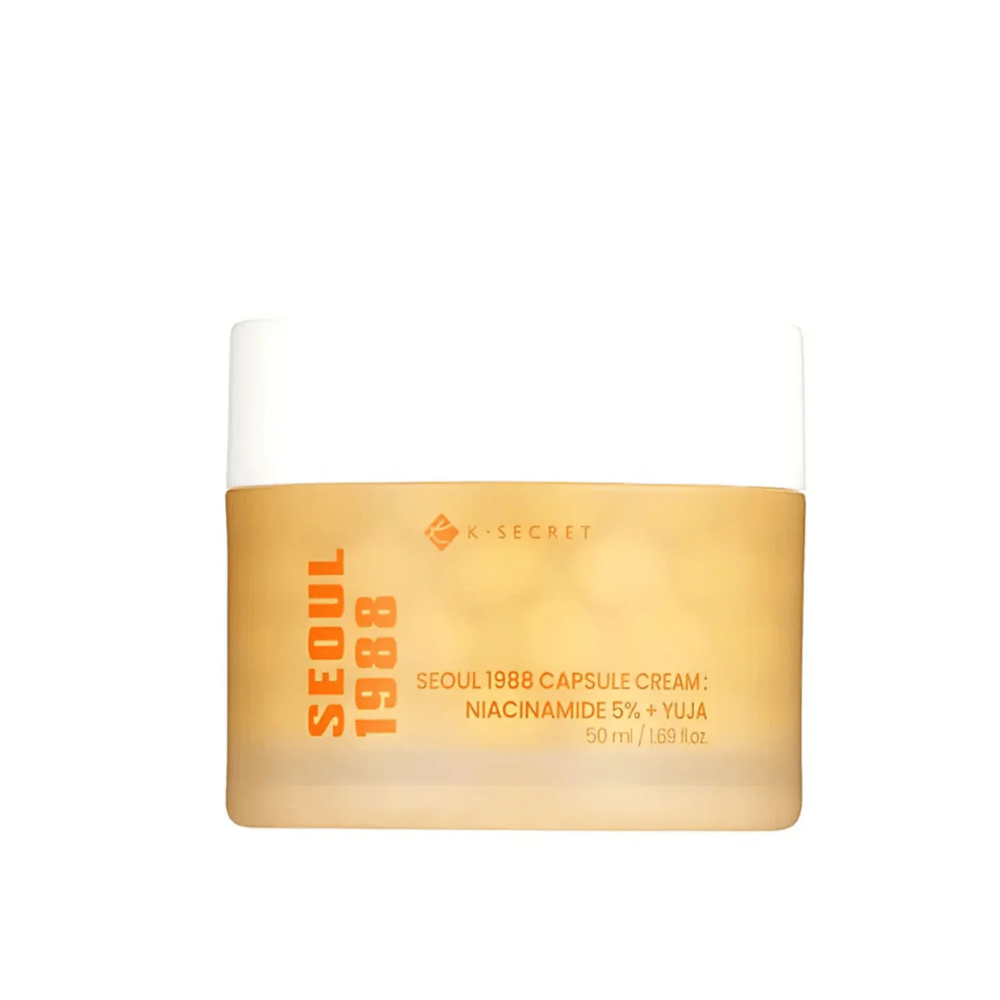 Nádoba s K-Secret Seoul 1988 Capsule Cream Niacinamide 5% + Yuja, 50 ml, v zlatom dizajnovom balení.