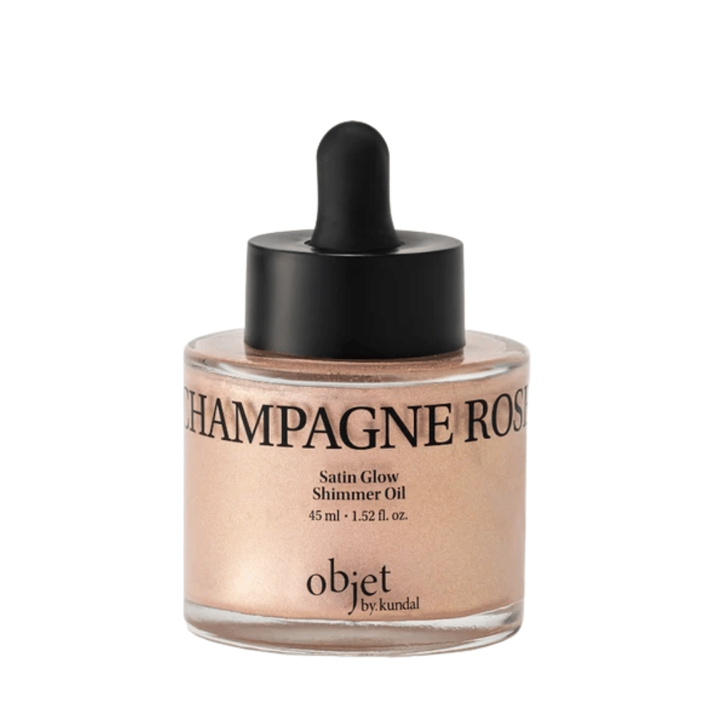 Objet by KUNDAL Satin Glow Shimmer Oil Champagne Rose 45 ml – rozjasňujúci telový olej s jemným ružovozlatým trblietavým finišom.