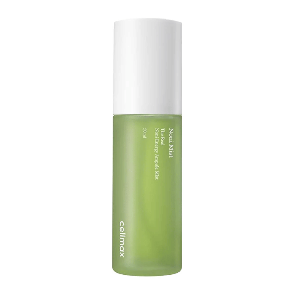 Celimax Noni Mist v zelenej fľaši s bielym uzáverom. Produkt, "The Real Noni Energy Ampule Mist," má kapacitu 50 ml a je propagovaný na dodanie energie a hydratácie pokožke.