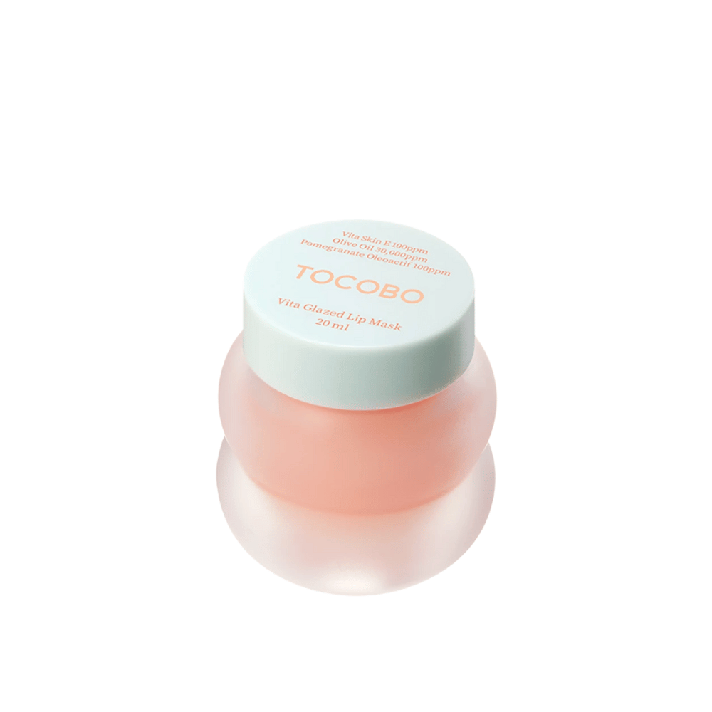 Zobrazuje sa nádoba s "Vita Glazed Lip Mask" od Tocobo. Nádoba je okrúhla a priehľadná so svetlo tyrkysovým viečkom. Maska vo vnútri je jemne ružová a navrhnutá na hydratáciu a starostlivosť o pery. Produkt má objem 20 ml.