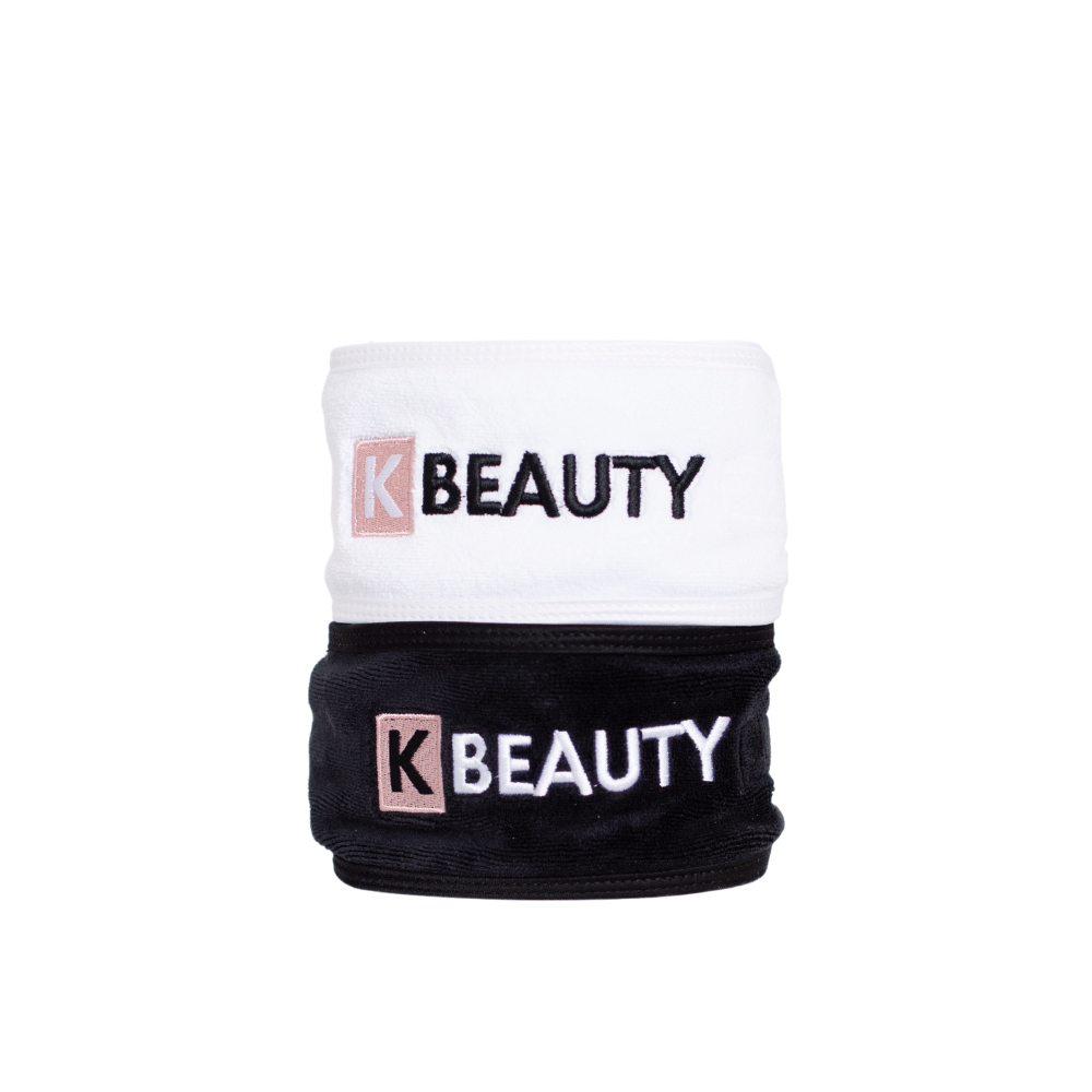 Dva čiernobiele K-Beauty Makeup čelenky so slovom krása.
